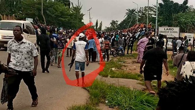 Police reveals identity of Man with riffle during protest against EFCC in Osun, write Residents