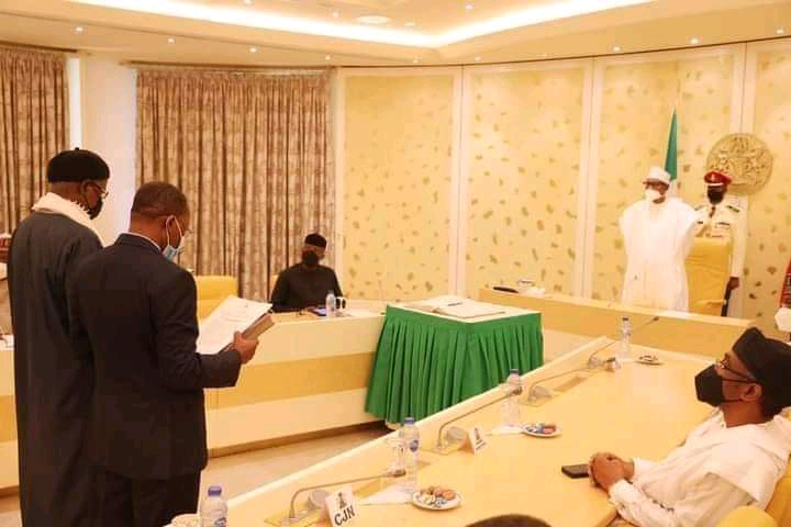 Buhari swears in Ekiti Man, 1 other as INEC Commissioners