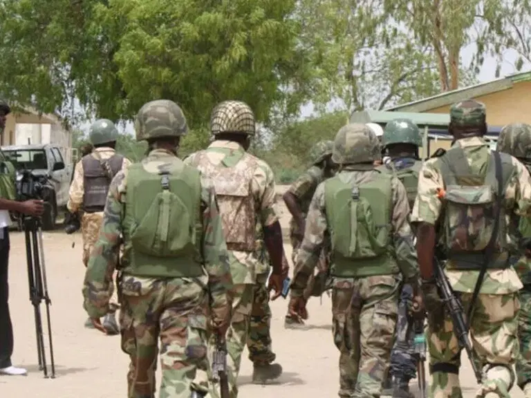 Ekiti: Nigerian Soldiers Turn Commercial Driver To A Sweeper For Refusing To Part With Bribe
