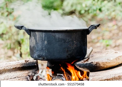 Nigerian Man nabbed at the point of cooking girlfriend’s body parts on fire