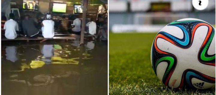 Football fans watch Epl game in flooded viewing centre (VIDEO)