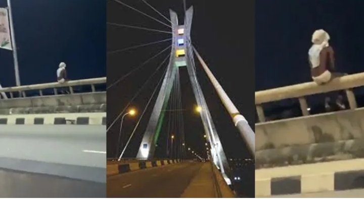 Nigerians react as Baffled man sits on Lekki-Ikoyi bridge railings (Video)