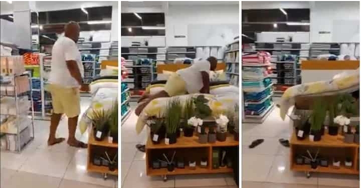 Funny moment chubby man breaks bed while testing it out in a mall
