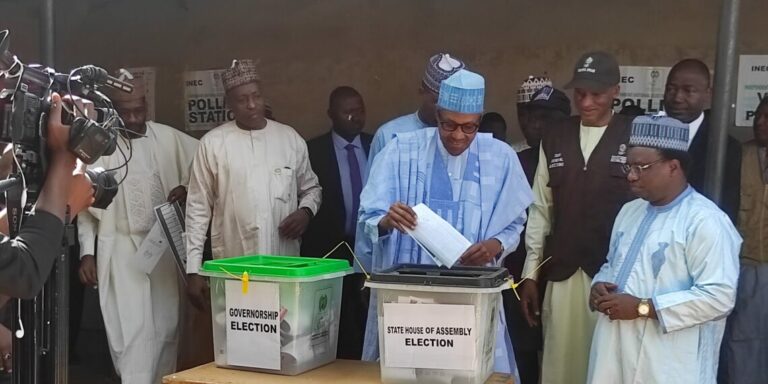 Buhari casts last vote as president, advises electorate