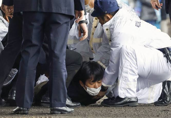 Japan’s PM evacuated after smoke bomb attack