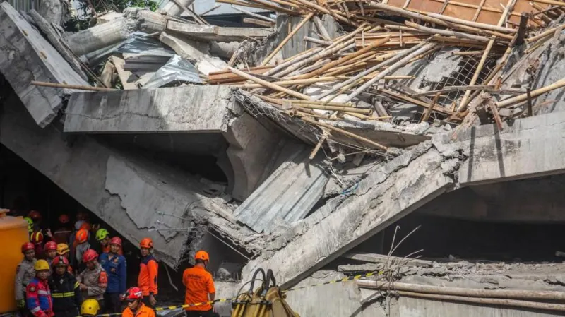 School Collapse Leaves Three Dead, Dozens Trapped